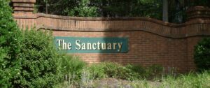 The Sanctuary neighborhood sign Gainesville Florida